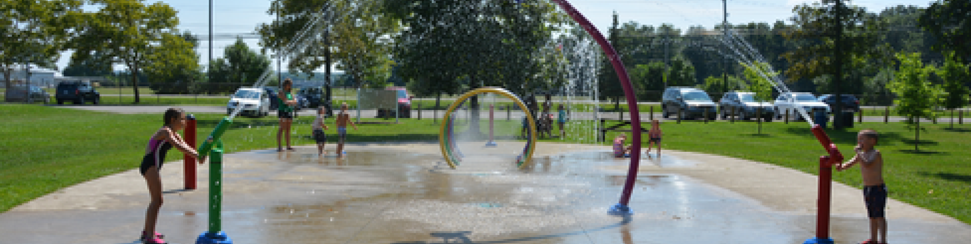 Splash pad with children playing at Jordan Lions Park