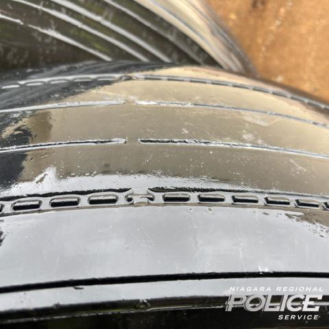 Close up of a transport truck tire.